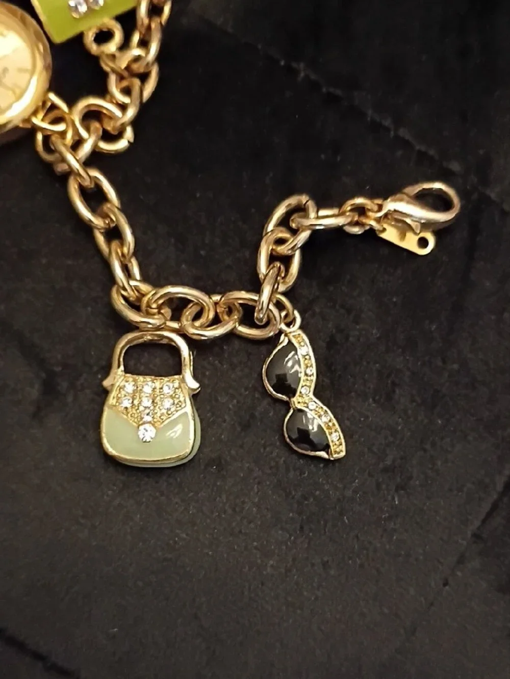 Gossip Gold-Tone Charm Bracelet Watch with Green and Red Accents